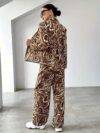 The Newness Cairo Geometric Print Suit A chic and modern suit perfect for spring featuring a striking geometric print