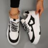 Newness Monochrome Magic Heart Pattern Sneakers Stylish monochrome heart pattern sneakers offering sporty comfort