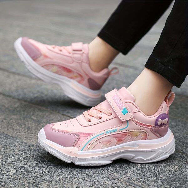 Adorable girls' solid color casual sneakers in a range of trendy colors. Perfect for everyday wear, these comfortable and durable sneakers are ideal for playdates and school. Designed for girls aged 14 and under.