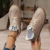 Newness Urban Edge Retro Snake Sneakers Chic and comfortable sneakers with a retro snake print design perfect for any occasion