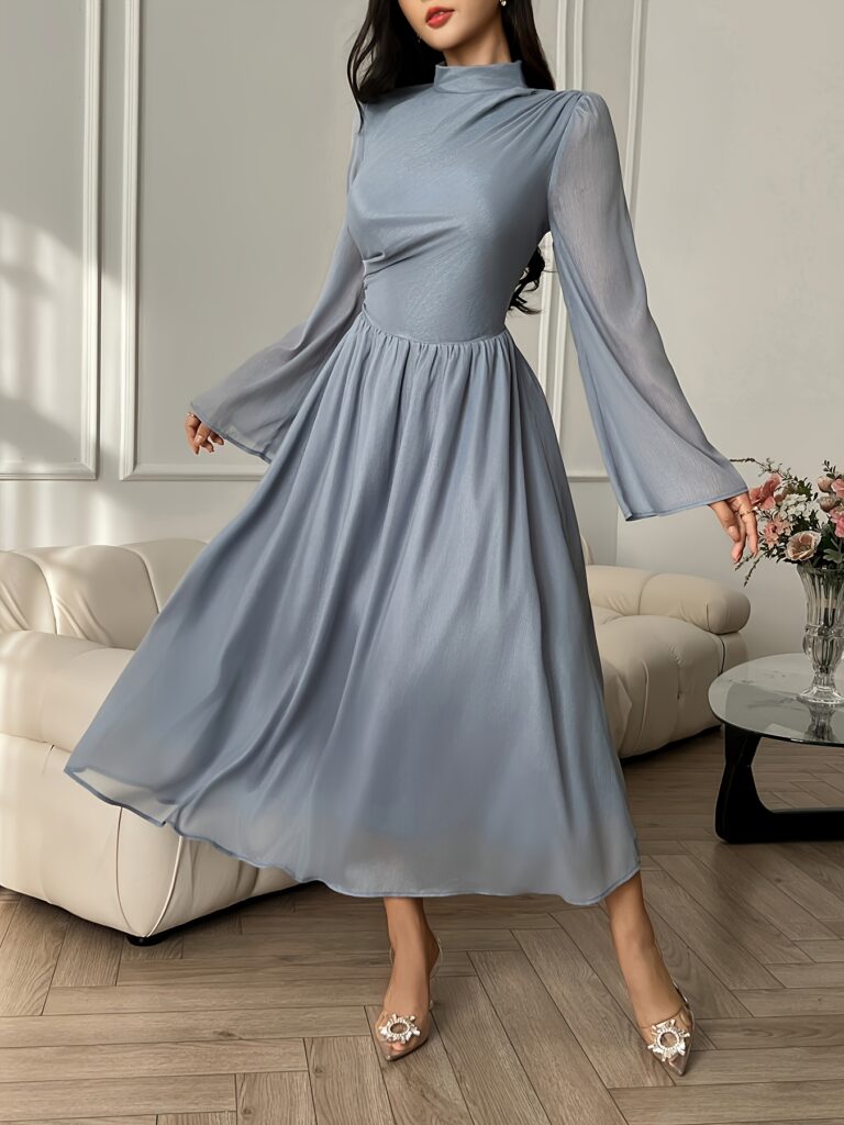 Model wearing the Cairo Elegant Peplum Dress by Newness, a chic and modern peplum dress perfect for any occasion.