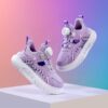 Pastel Pop Girls Low Top Sneakers showcasing the rotating buckle pastel purple and pink checkered and striped design and comfortable cushioned sole
