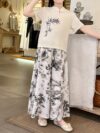 Newness Botanical Bliss Girls Summer Outfit A charming two piece set ideal for summer Features a stylish top and comfortable bottoms in a botanical print