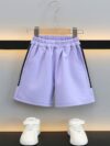Stylish purple sports set for boys aged 12 and under Breathable polyester fabric ensures comfort and freedom of movement Perfect for summer activities