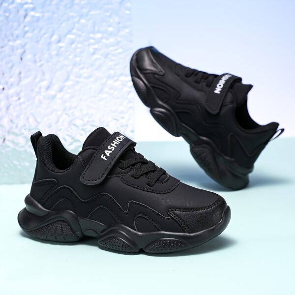 Stylish and comfortable ActiveAce Kids' Low-Top Tennis Shoes in action. A child is shown wearing the shoes, running and playing. Breathable mesh and synthetic upper are visible, highlighting the shoe's lightweight and durable design. Perfect for all-season wear.