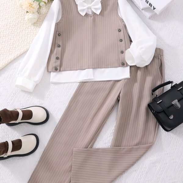 Teen girl modeling a stylish striped pants set ideal for fall The outfit is comfortable and chic