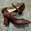Newness Timeless Square Toe Mary Janes Classic black square toe Mary Jane shoes with a comfortable low heel showcasing a vintage inspired design with modern appeal