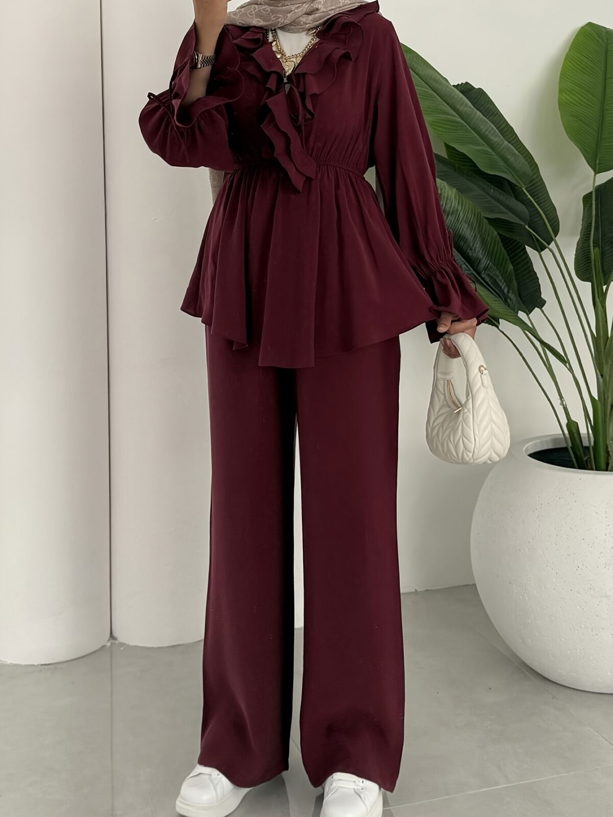 The Newness Milan Two Piece Pant Set in luxurious polyester A sophisticated and stylish two piece outfit perfect for any occasion