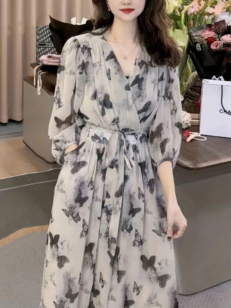 Effortlessly chic Newness Casablanca Floral Print Midi Dress, showcasing a flattering silhouette perfect for any occasion.