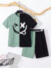 Adorable boy wearing a trendy color block set perfect for playtime school or any casual occasion The outfit features vibrant colors and a comfortable soft fabric
