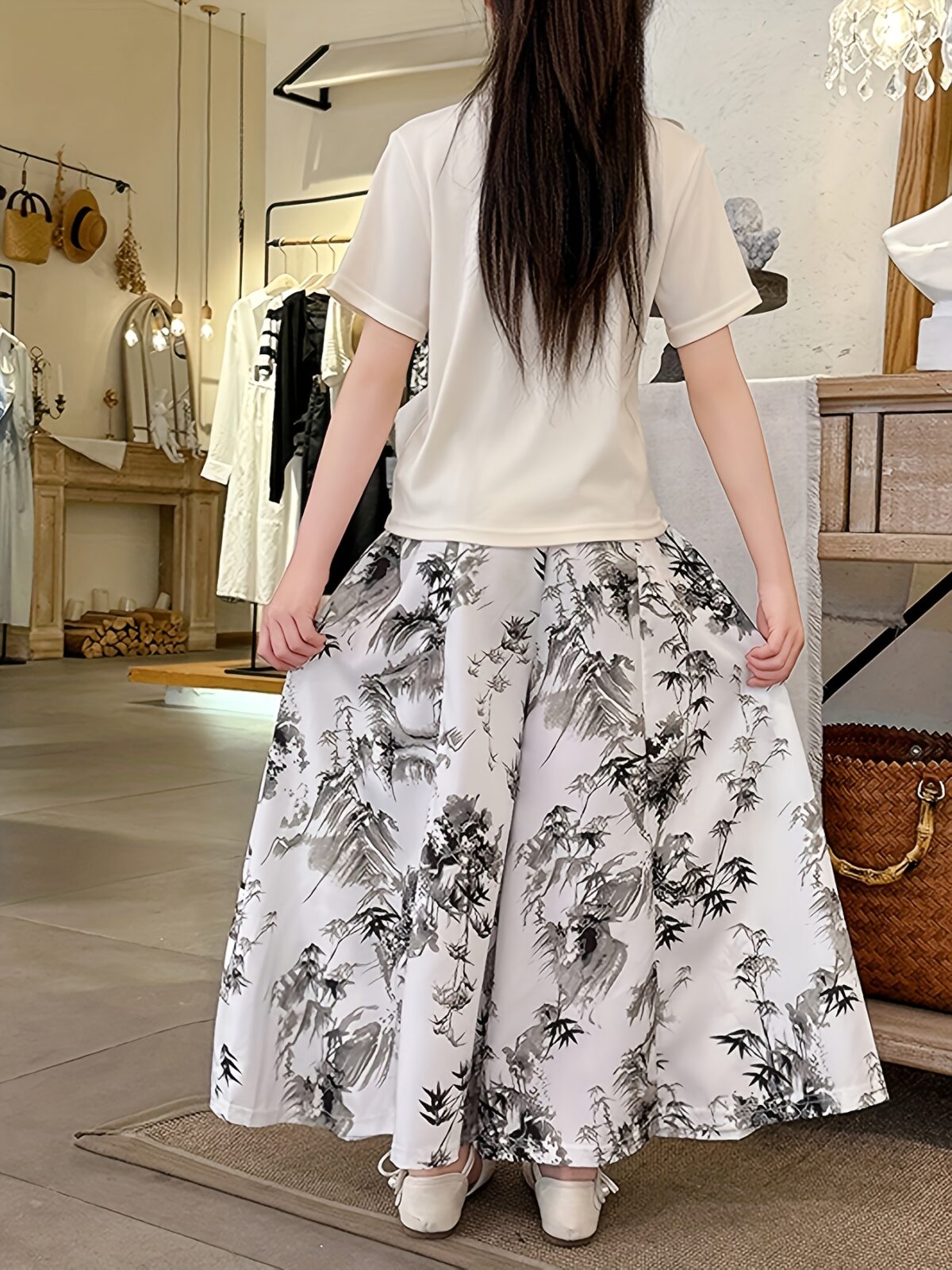 Newness Botanical Bliss Girls Summer Outfit A charming two piece set ideal for summer Features a stylish top and comfortable bottoms in a botanical print