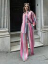 The Newness Riviera Striped Suit Set A chic spring outfit featuring a striped button up shirt and belted pants Perfect for any occasion