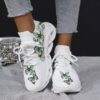 Newness Whimsical Butterfly Print Sneakers Chic and comfortable sneakers featuring a playful butterfly print perfect for any occasion