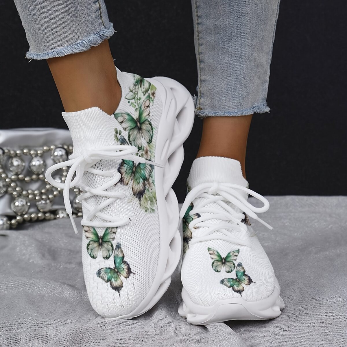 Newness Whimsical Butterfly Print Sneakers Chic and comfortable sneakers featuring a playful butterfly print perfect for any occasion