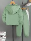 Stylish boys color block jacket and pants set featuring embroidered dinosaur details Perfect for spring or fall