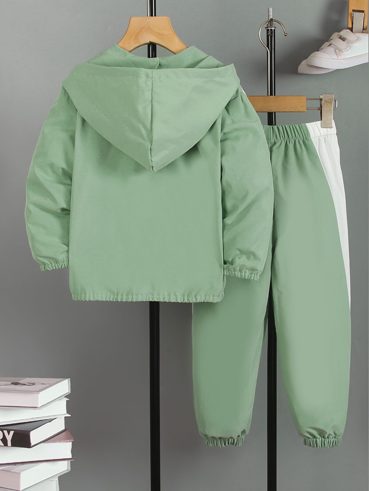 Stylish boys color block jacket and pants set featuring embroidered dinosaur details Perfect for spring or fall
