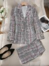 Model showcasing the Newness Kensington Plaid Skirt Set a chic and modern take on the classic plaid skirt set Featuring a stylishly tailored skirt and coordinating top