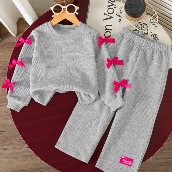 Adorable girls two piece autumn outfit cozy knit top and loose fitting pants perfect for fall adventures Dubai design