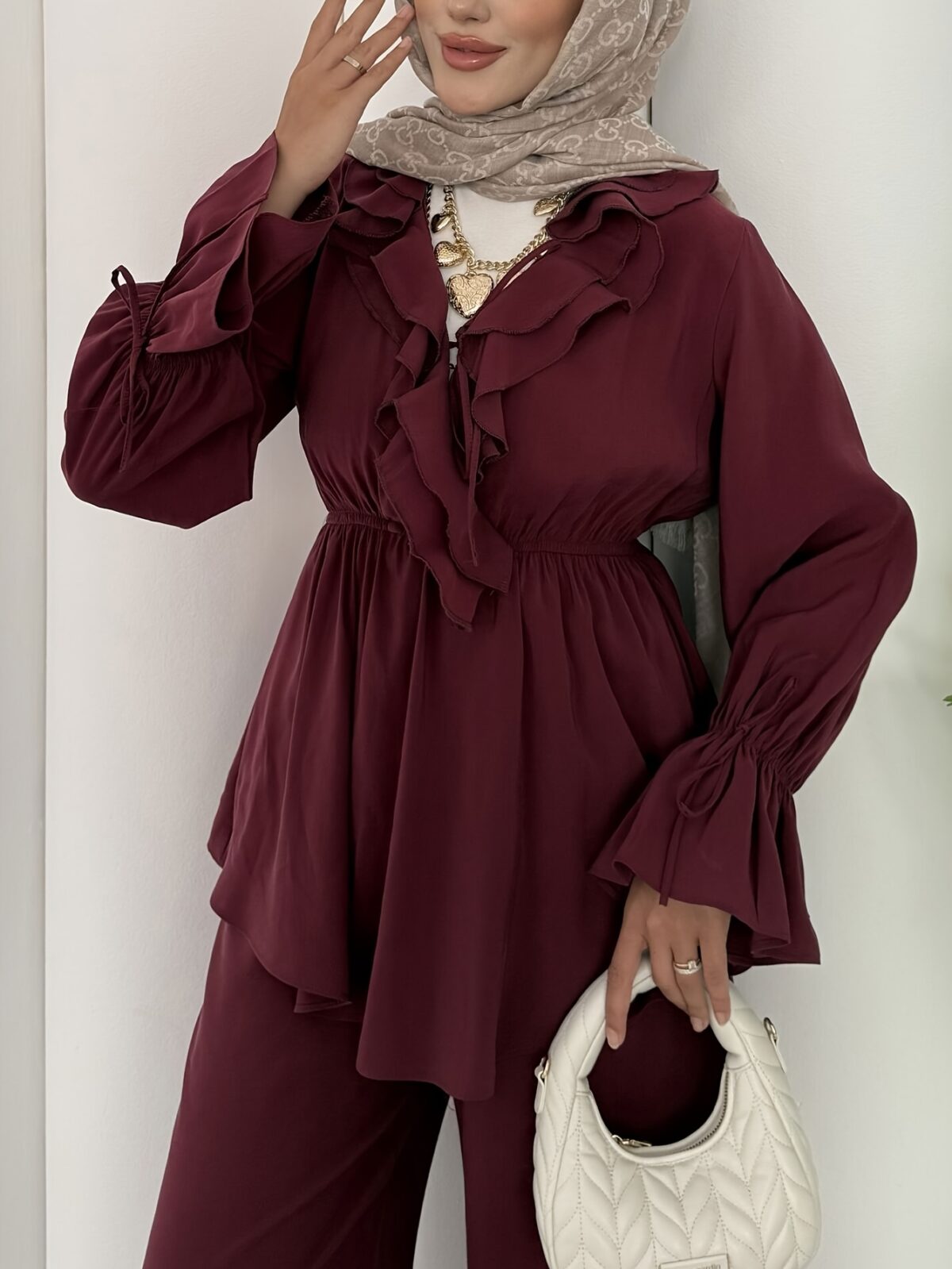 The Newness Milan Two Piece Pant Set in luxurious polyester A sophisticated and stylish two piece outfit perfect for any occasion