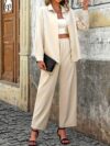 The Cairo Beige Pantsuit Set by Newness A modern and chic pantsuit in a versatile beige color perfect for any occasion Made with 100 comfortable polyester