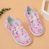 Adorable girls heart pattern loafers in a soft breathable fabric Perfect for everyday wear these slip on shoes offer both comfort and style