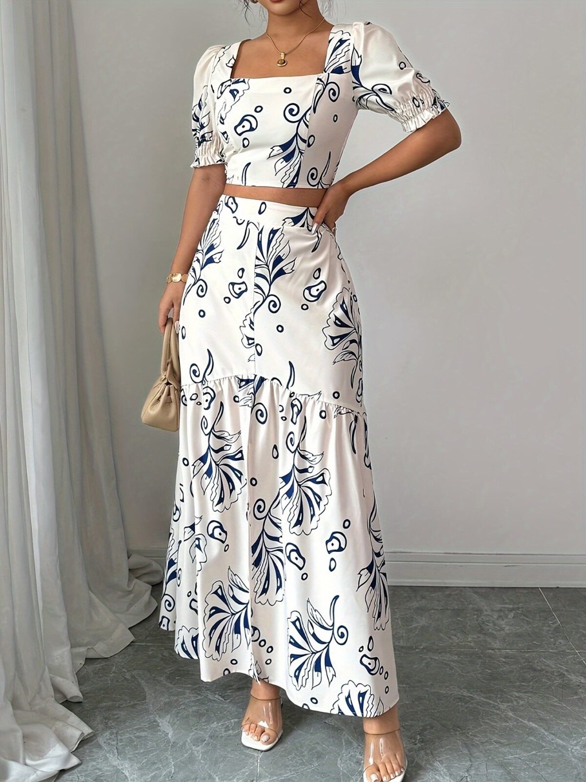 Effortlessly chic Casablanca Floral Print Skirt Set from Newness perfect for spring and summer Features a flowing skirt and coordinating top in a vibrant floral print