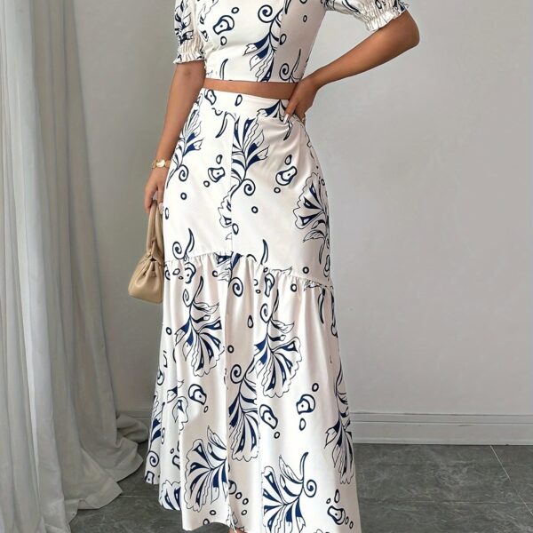 Effortlessly chic Casablanca Floral Print Skirt Set from Newness perfect for spring and summer Features a flowing skirt and coordinating top in a vibrant floral print