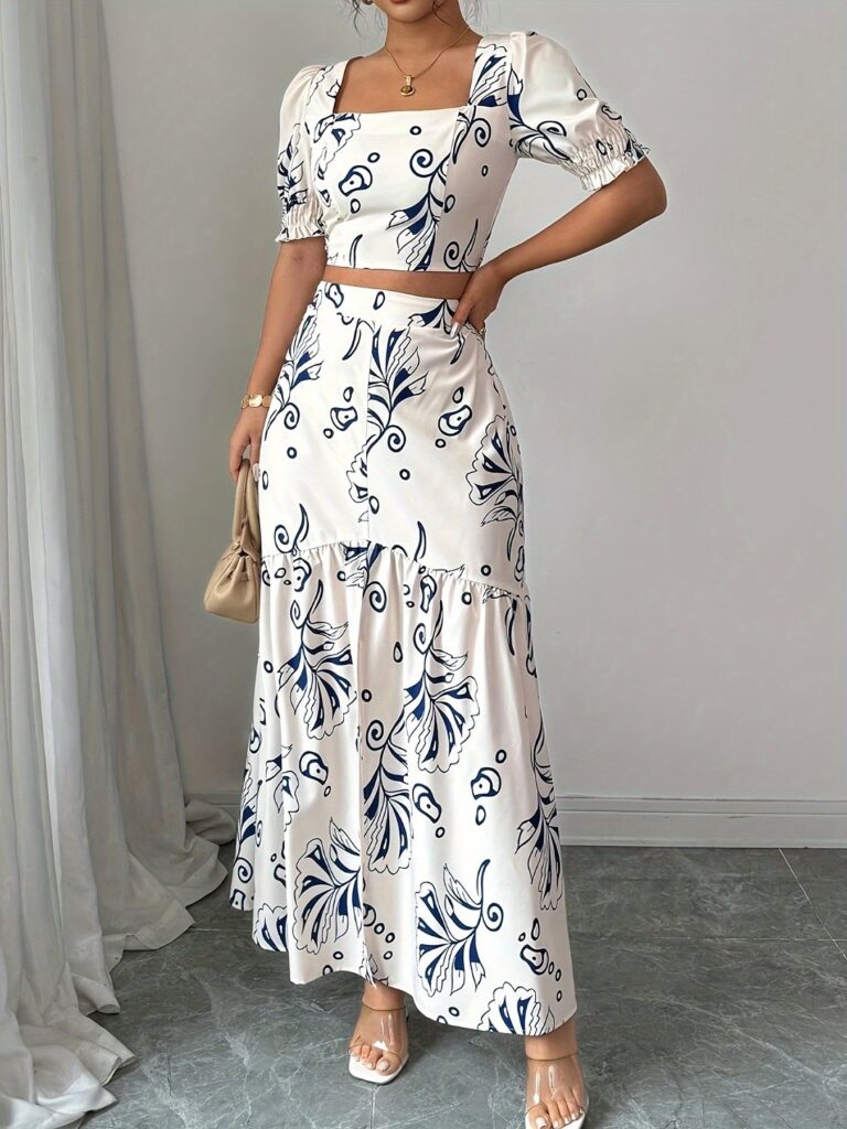 Effortlessly chic Casablanca Floral Print Skirt Set from Newness, perfect for spring and summer. Features a flowing skirt and coordinating top in a vibrant floral print.