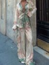Embrace effortless chic with the Newness Riviera Escape Tropical Print Set This stunning two piece set perfect for vacations and spring outings features a vibrant tropical print and flattering silhouette