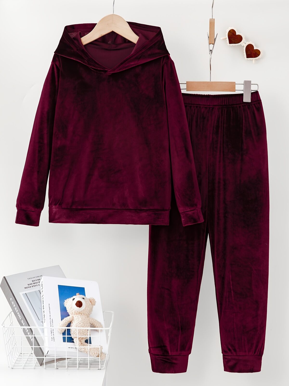 Indulge in ultimate comfort with the Newness Luxe Lounge Velvet Hooded Set This luxurious loungewear set features a plush velvet fabric and a flattering hooded design perfect for relaxing at home or running errands in effortless style