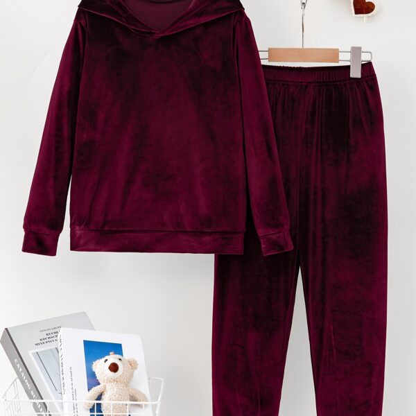 Indulge in ultimate comfort with the Newness Luxe Lounge Velvet Hooded Set This luxurious loungewear set features a plush velvet fabric and a flattering hooded design perfect for relaxing at home or running errands in effortless style