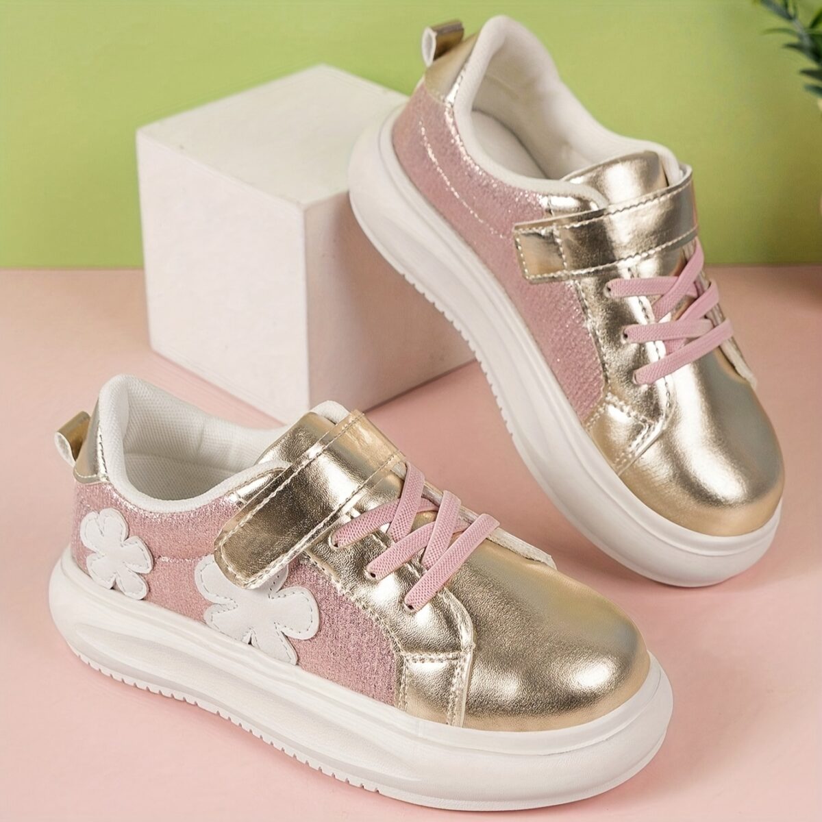 Adorable girls pink and white floral sneakers perfect for play or everyday wear Twinkle Toes brand