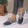 Newness Metro Chic Geometric Print Sneakers Comfortable and stylish geometric print sneakers perfect for any casual occasion