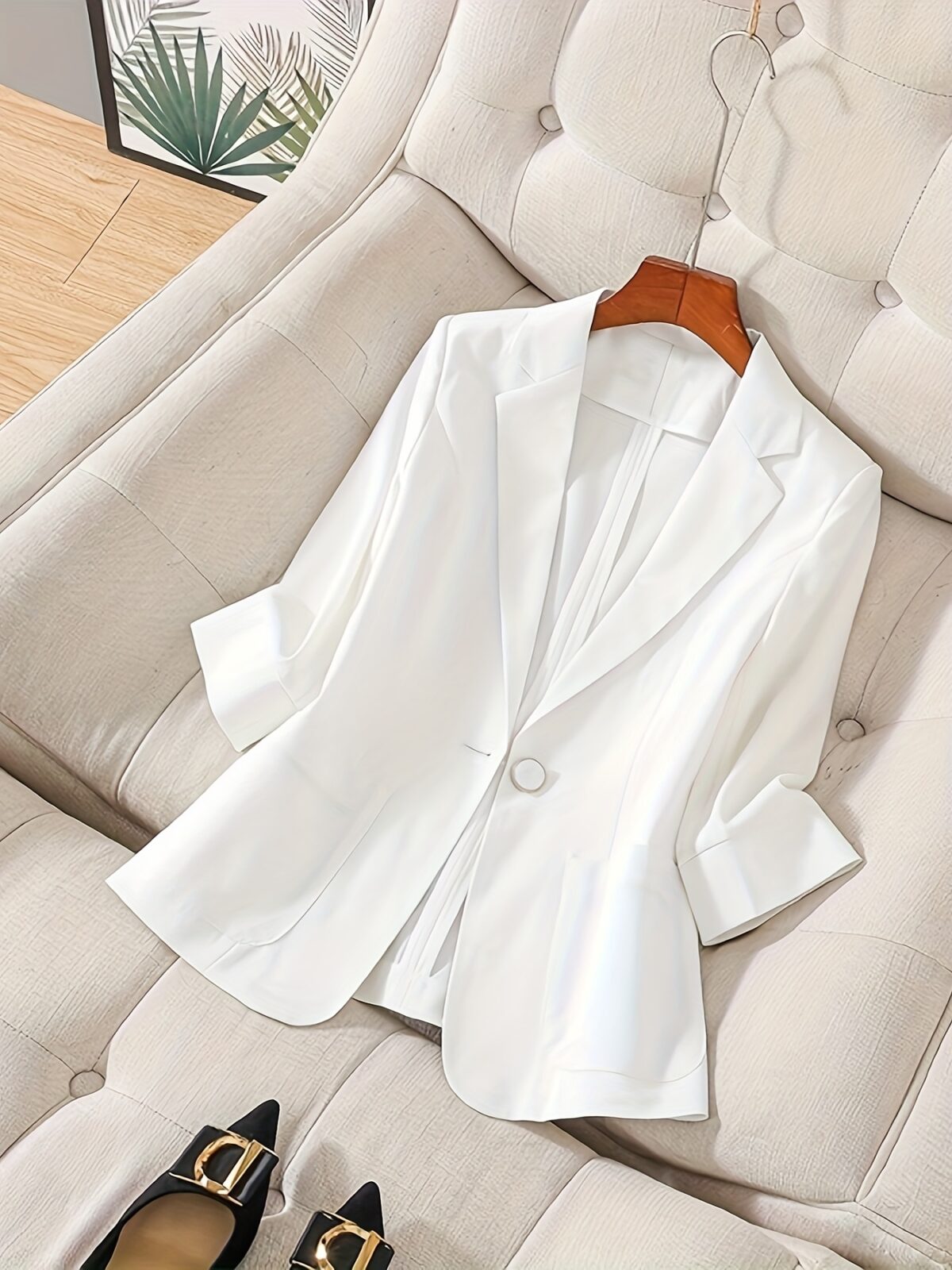 Womens elegant white blazer perfect for spring and summer offering a chic and comfortable fit Versatile jacket to elevate your style