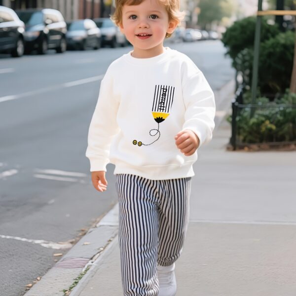 Adorable boys hoodie and sweatpants set featuring a stylish pencil pattern hoodie and comfortable striped sweatpants Perfect for school playdates or cozy days at home