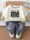 Stylish boys two piece autumnwinter outfit featuring a trendy letter print hoodie and comfortable jeans perfect for back to school holidays or parties