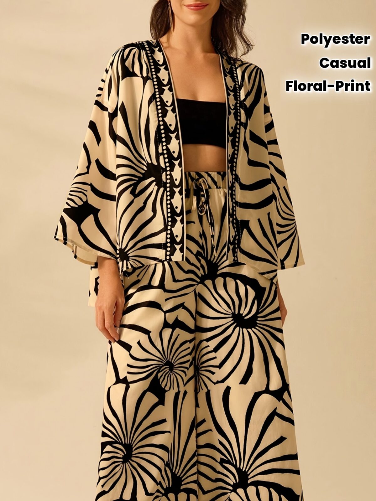 Effortlessly chic Casablanca Geometric Print Kimono from Newness perfect for summer Features a striking geometric print and relaxed fit