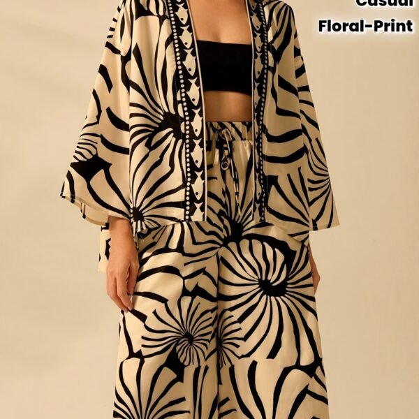 Effortlessly chic Casablanca Geometric Print Kimono from Newness perfect for summer Features a striking geometric print and relaxed fit