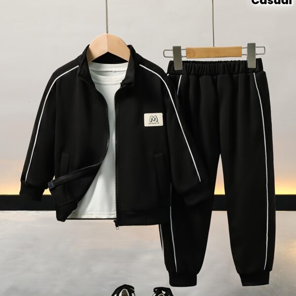 Stylish boys tracksuit set in navy blue with white stripes perfect for active play or casual wear Features a comfortable long sleeve jacket and matching pants