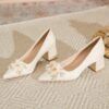 Newness Ethereal Bloom Floral Block Heels Elevate your style with these chic and comfortable floral block heels perfect for any occasion