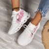 Newness Bloomsbury Floral Print Sneakers in white showcasing breathable knit fabric and lightweight TPR sole Perfect for all season wear