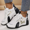Newness Golden Dragon Accent Black Sneakers Sleek black sneakers adorned with a golden dragon accent showcasing breathable comfort and edgy design