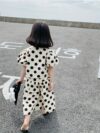 Adorable girls polka dot suit perfect for summer made from 100 soft cotton The suit features a mention specific details like sleeveless top and shorts or skirt design