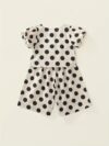 Adorable girls polka dot suit perfect for summer made from 100 soft cotton The suit features a mention specific details like sleeveless top and shorts or skirt design