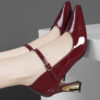 Bordeaux Nights Burgundy Mary Jane Heels by Newness These elegant heels feature a glossy finish a comfortable block heel and an adjustable ankle strap perfect for spring events