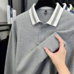 Modern Minimalist Mens Cotton Long Sleeve Shirt in versatile cream color shown on a male model The shirt is wrinkle resistant and breathable perfect for spring or fall