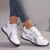Newness Urban Edge Minimalist Lace Up Sneakers Chic comfortable and perfect for any occasion A close up shot showcasing the minimalist design and lace up detail