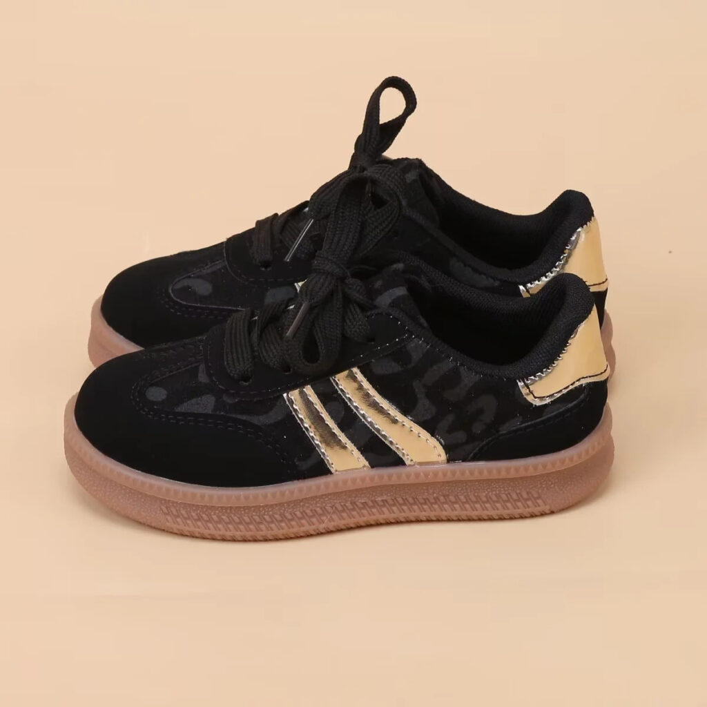 Newness Leopard Leap Girls' Black & Gold Sneakers: Stylish black sneakers with gold accents and a leopard print.