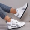 Newness Urban Edge Minimalist Lace Up Sneakers Chic comfortable and perfect for any occasion A close up shot showcasing the minimalist design and lace up detail