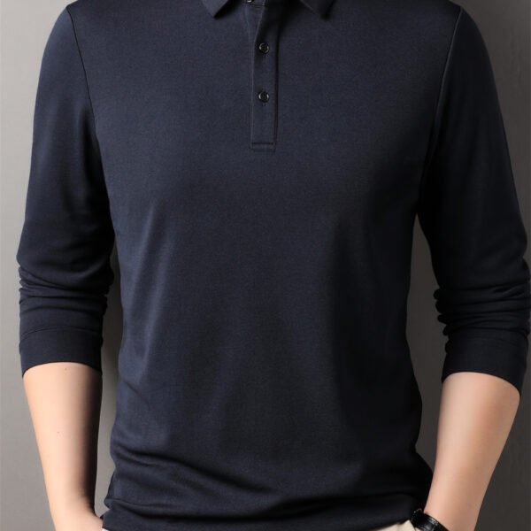 Sophisticated Style Men's Velvet Blend Long Sleeve Polo Shirt in deep blue. Close-up showing luxurious texture and comfortable fit.